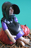 Amish Quilts - Amish girl on pumpkin Amish Quilts - Amish girl on pumpkin