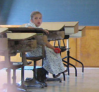 Amish Quilts - Amish girl at school Amish Quilts - Amish girl at school