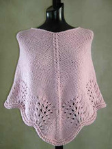 scalloped edge poncho knitting pattern, shown in size S