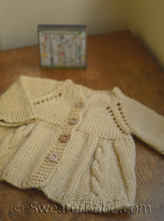 knitting pattern photo of #66 Beautiful Cabled Baby Jacket Knitting Pattern