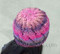 back of hat photo of #116 One-Ball Curvy Lace Hat PDF Knitting Pattern