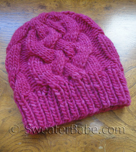 knitting pattern for sublime cabled hat - shown in baby size
