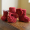 embellished samples of crochet booties - instructions included in pattern