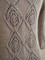 diamonds and lace top-down cardigan knitting pattern. shown in size XS.