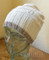 dreamcatcher hat knitting pattern, lace version worn uncuffed