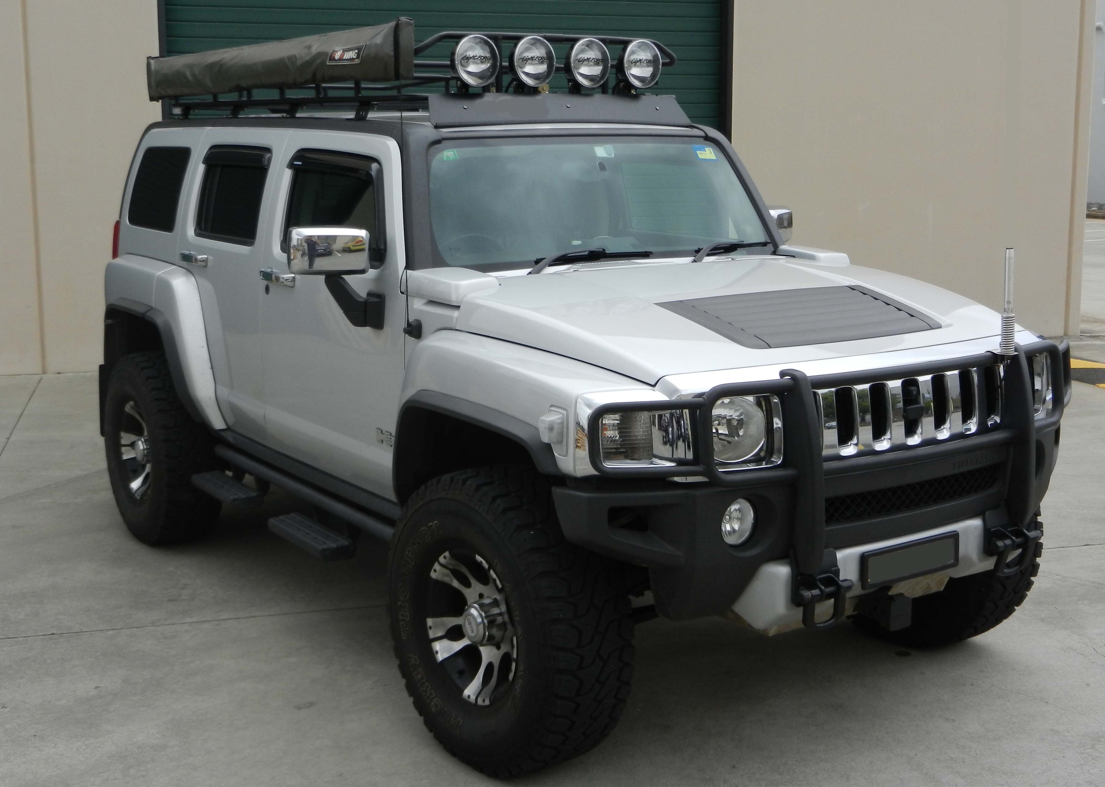 Hummer H3 Yellow Lifted