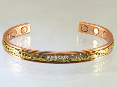 Copper Magnetic Bracelet with woven brass wire that looks like embroidery. This is a very popular copper bracelet for women
