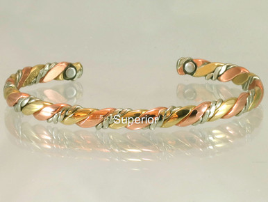 Copper bracelet with a double spiral weave representing an umbilical cord, the life-giving connection of body and soul. "If you feel lost while in deep meditation", my master taught me, "just follow the silver cord back to yourself."