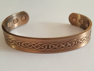 The celtic knot magnetic copper bracelet is embossed with the celtic knot symbol referred to as the mystic knot or endless knot.