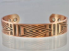 This mens copper bracelet has a  classic native American motif.