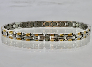 This stainless steel magnetic bracelet  has 5/16" wide x 3/8" long links with 23  N52 5200 Gauss rare earth magnets in an 10 1/2" length.  It has a magnetic therapy pull strength of 930 grams.
