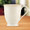 French Perle White Mug.
What makes this mug so appealing is its beautifully beaded motif. That, and the distressed tea-stain finish that encircles the rim.