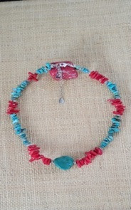 Summer Turquoise and Coral Necklace
Handmade Item
Length : 16" + 2"  Extender
Materials : Turquoise and Coral Beads,
Brass silver color stars.
Closure : Silver Brass Lobster Clasp