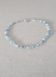 Summer Aquamarine Necklace with Pearls
Handmade Item
Length : 16" + 2" Extender
Materials : Fresh Water Pearls, 
Aquamarine beads, Silver Brass Stars
Closure: Silver Brass Lobster Clasp