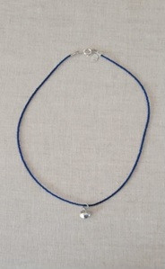 Lapis Lazuli Choker Necklace with Silver Pendant
Handmade Item
Length : 14 1/2 "
Materials : Lapis Lazuli Beads, Sterling
Silver Pendant
Closure : Silver Brass Round Clasp