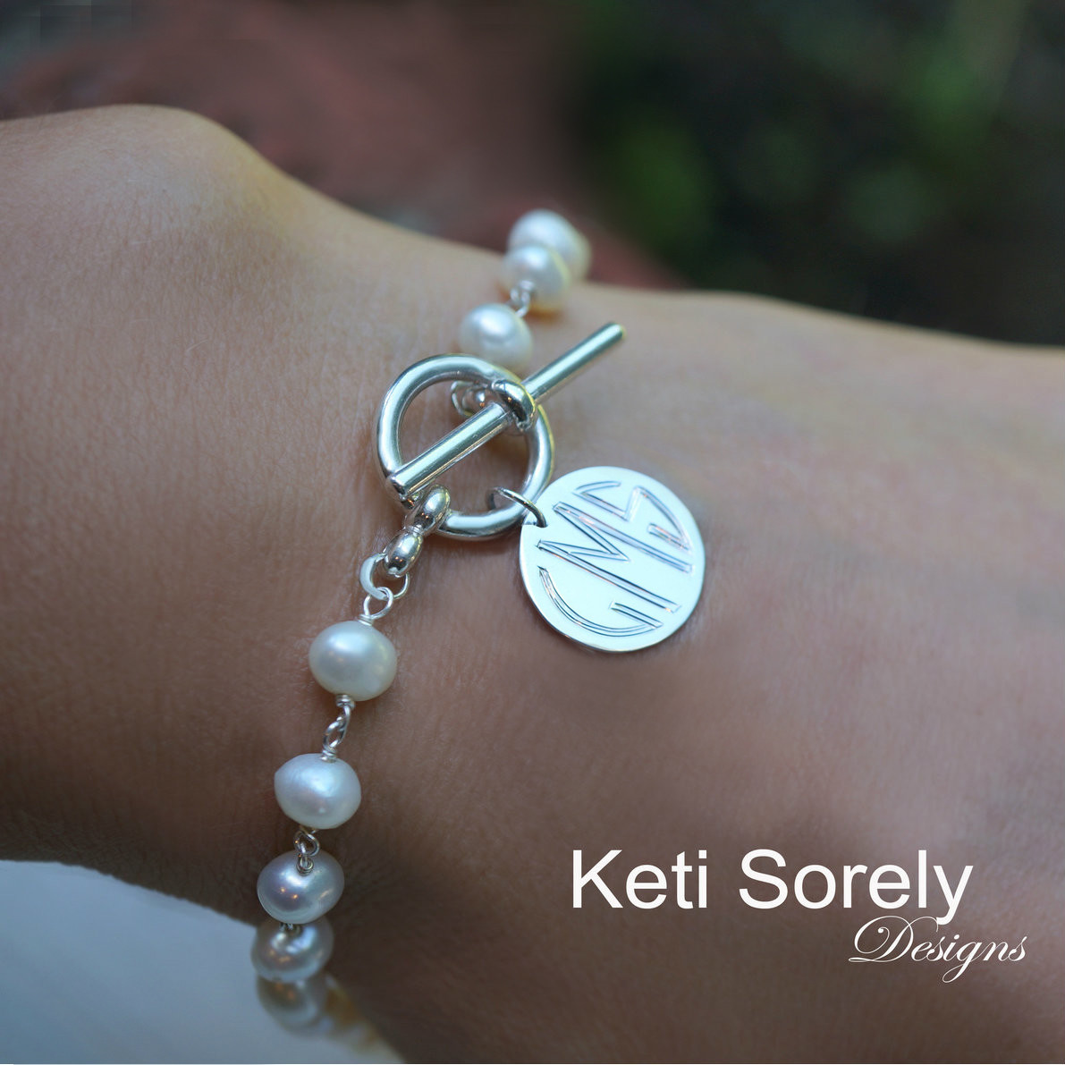 Personalized monogram charm bracelet with white pearls and toggle