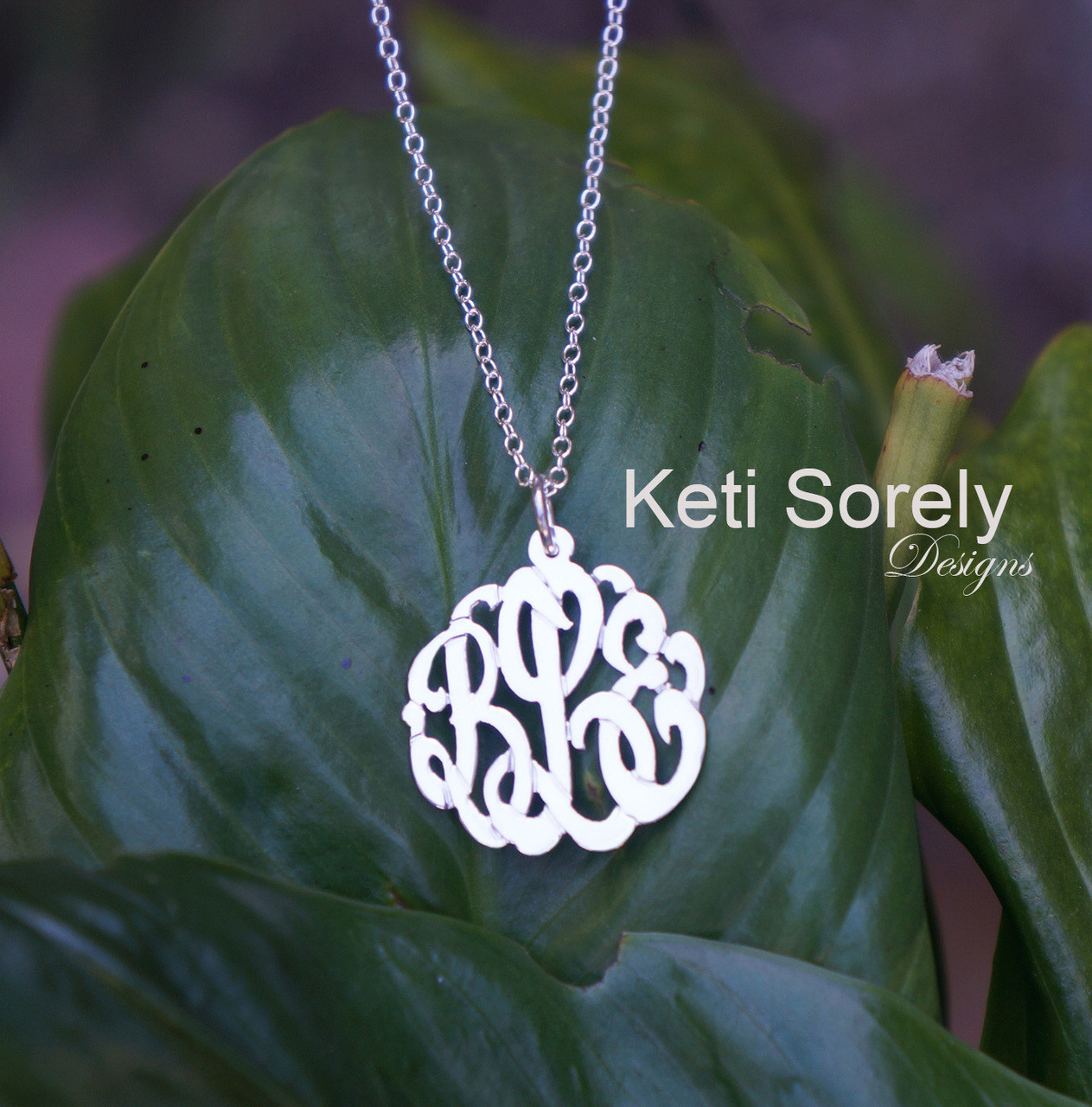 Custom made monogram pendant with personalized initials in script font