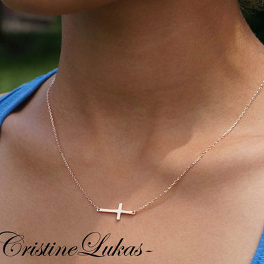 Celebrity style small sideways cross necklace custom made in Sterling Silver, 10K gold, 14K gold or 18K solid gold.