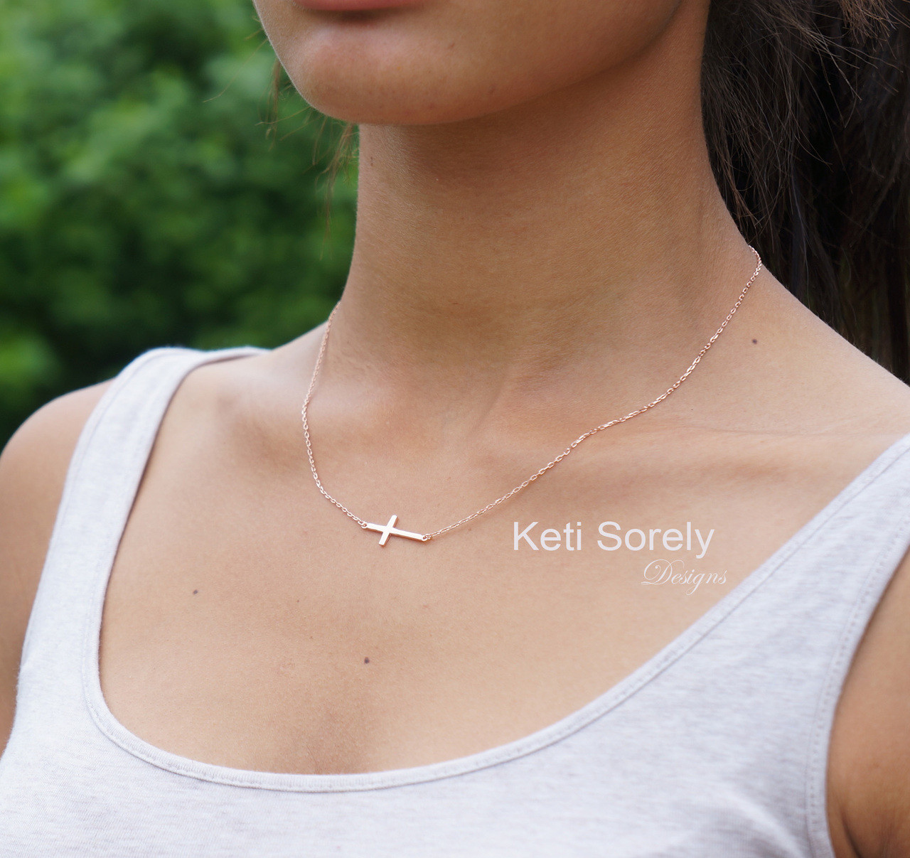 thin sideways cross necklace