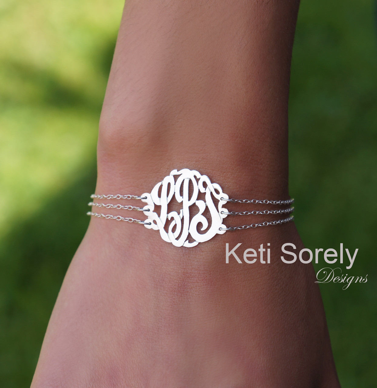 white gold monogram bracelet