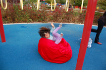 Kid falling into bean bag