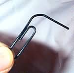 Straighten out paperclip leg
