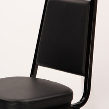 TitanPRO™ Trapezoidal Back Stacking Banquet Chair with Black Vinyl Seat - Black Frame