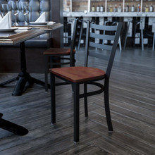 HERCULES Series Black Ladder Back Metal Restaurant Chair - Cherry Wood Seat [FLF-XU-DG694BLAD-CHYW-GG]