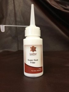 This revolutionary new filler is a thick lotion in consistency, but it’s fast drying time and high solids content can fill small scratches and other damage very quickly. It can be sanded immediately to a smooth edge with up to 240 grit and will not tear. On small damage, there is very little interruption to the grain so simply refinishing usually produces an invisible repair. From major cat scratch damage to highly worn steering wheels, this filler achieves amazing results by building a fast succession of layers before sanding it smooth. It can also be used in a similar fashion with small tears to vinyl where traditional vinyl welding will produce a repair more obvious than the damage you are trying to fix. This product is not recommended where high flexibility and softness are important. It is excellent for transit damage. It can also be used as a texturing agent by dabbing small amounts with an irregular faced sponge.