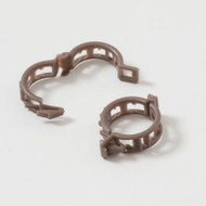 Our current stock of clips are brown and larger that the older white ones.