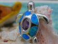 Turtle pendant made of sterling silver, amethyst and blue opal. 