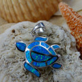 Turtle pendant made of sterling silver and blue opal.