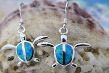 Turtle earrings made of sterling silver and blue opal.