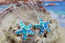 Starfish wire earrings made of stirling silver and blue opal. 