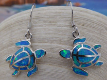 Turtle earrings made with sterling silver and blue opal.