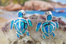 Turtle stud earrings made of stirling silver and blue opal. 