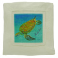 Linen cocktail napkin with a turtle.