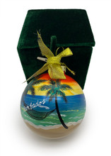 A glass Christmas Ball hand painted all around.