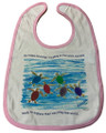 A cotton bib with the happy hatchlings design and pink trim. 
