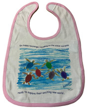 A cotton bib with the happy hatchlings design and pink trim. 
