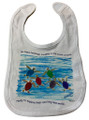 A cotton bib with the happy hatchlings design and white trim. 