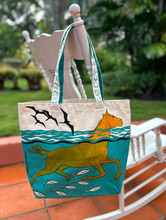 A bag with racehorse swimming.
