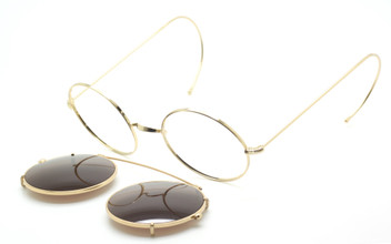 True round vintage shiny gold eyewear with matching clip on sunglasses at www.theoldglassesshop.co.uk
