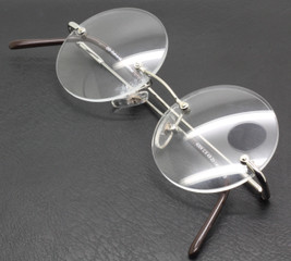 Beuren 4004 True Round Rimless Eyewear In A Silver Finish At The Old Glasses Shop Ltd