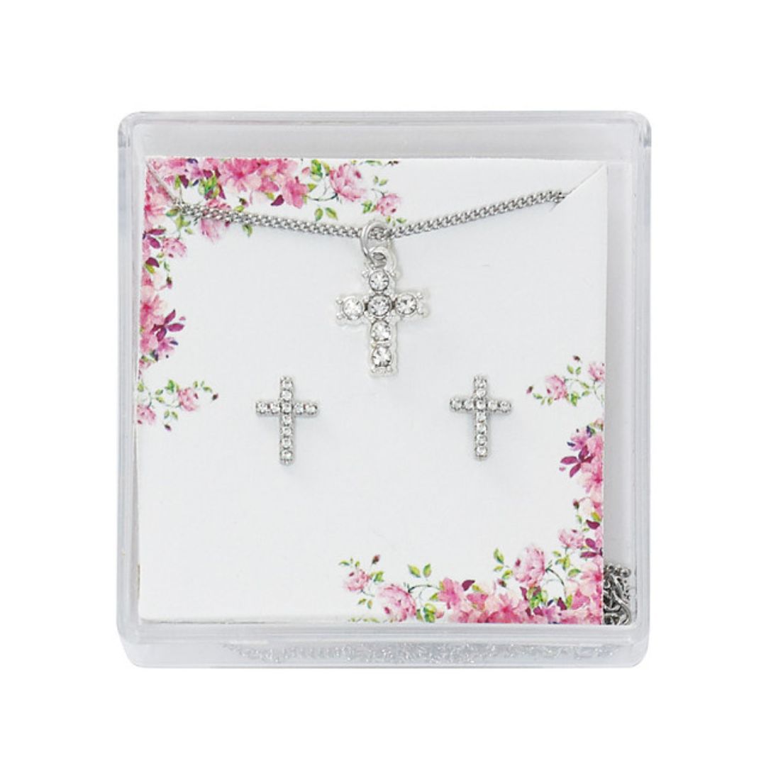 a cross necklace and earrings