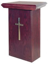 Mahogany-stained square wood stand with a brass cross on the front.