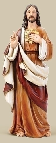 Sacred Heart of Jesus Statue by Joseph Studio.  Resin/Stone Mix. Dimensions: 24"H x 9.25"W x 7"D