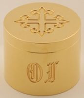 Solid Brass. 24k Bright Gold Plated. Engraved with OI and an Engraved cross on cover. Measures 1 3/8"H. x 1 11/16" dia.