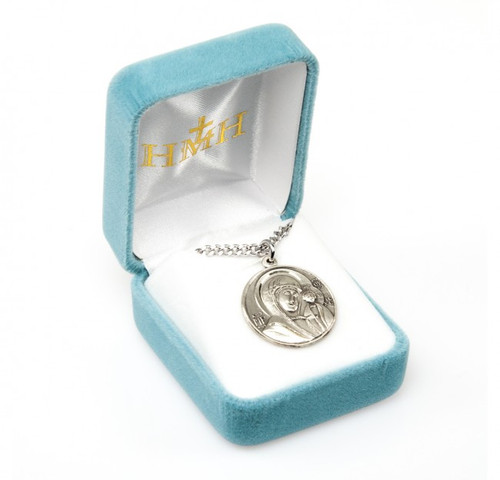  A deluxe velour gift box is included.
Dimensions: 1.0" x 0.9" (25mm x 22mm). 
Solid .925 sterling silver.  
Weight of medal: 4.6 Grams.  
Made in the USA.