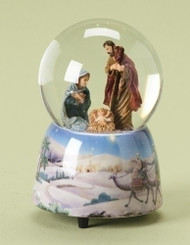 Image of the Musical Holy Family Water Globe with a painted base of the Three Kings traveling.